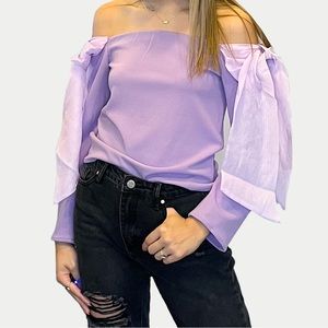 Boutique clothing sale. Lilac bow top